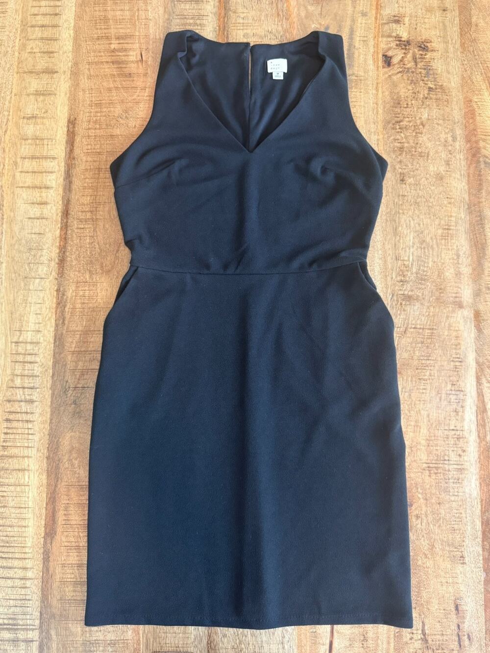 A New Day Women's Sheath Dress Size M Black Sleeveless V-Neck Stretch Pockets